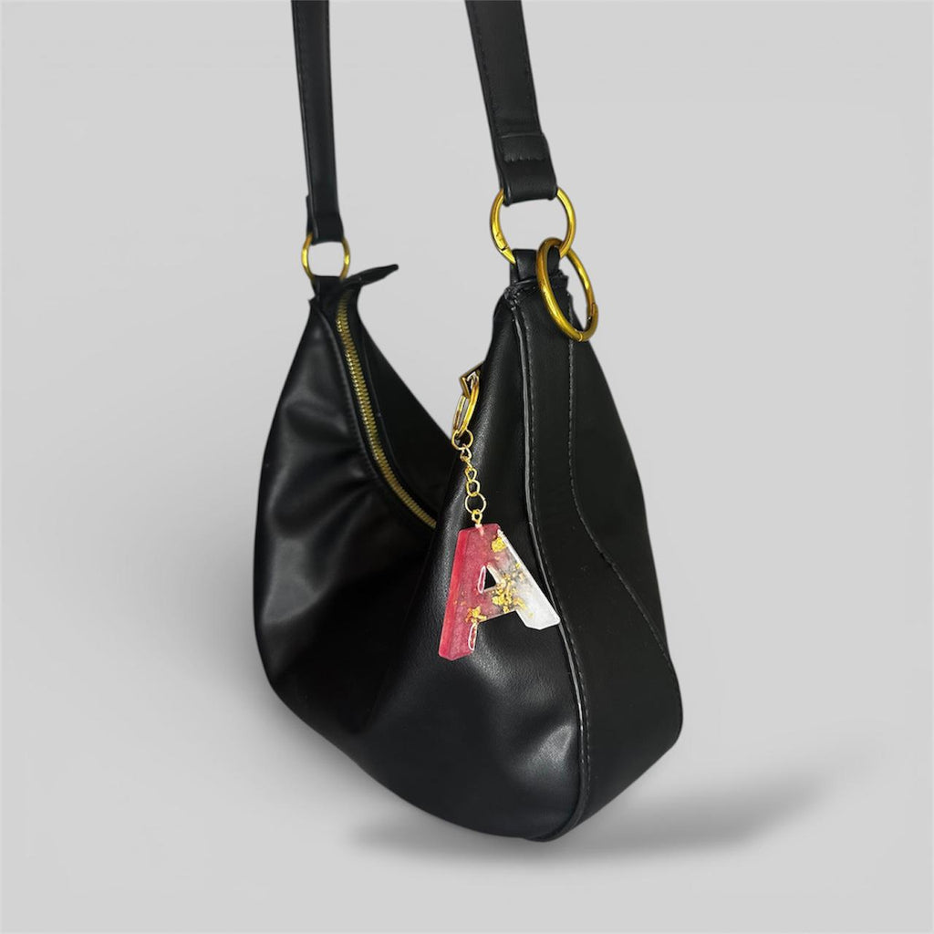 Llavero personalizado de dos colores con dorado · Hecho a mano